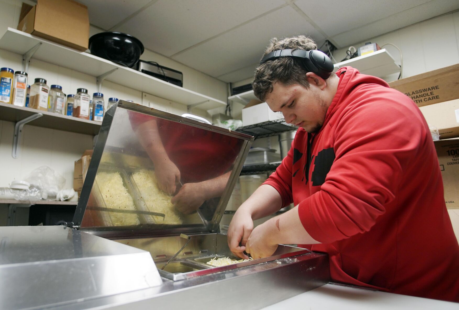man prepares food